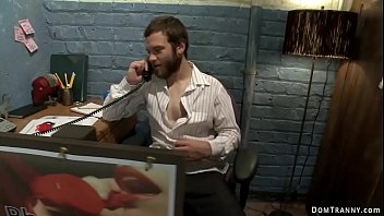 Big tits brunette shemale TS Foxxy caught her colleague Jesse Carl wanking cock during phone call in office then tied him and anal fucked