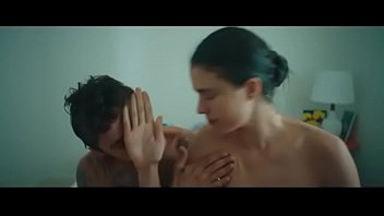 Margaret Qualley shows her nice small tits, hot ass and hairy pussy in sex scenes from 2020’s short Love Me Like You Hate Me