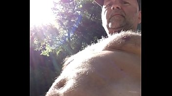 nudist exposing big belly and soft penis