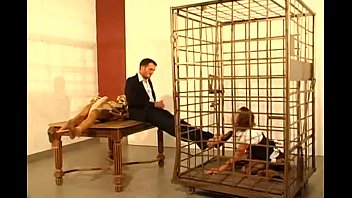 German secretary girl licks feet and sucks cock of her boss in cage