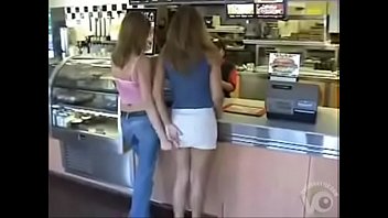 Video of girl lifting the skirt of her sexy friend in a fast food