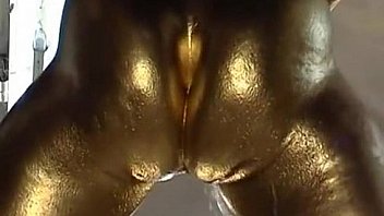 Gold painted pussy fucks with metal dildo