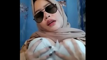 Malay busty girl showing tits on camera