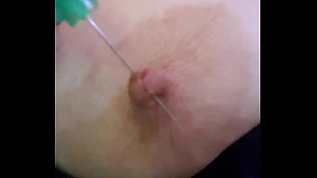 Playing with needles in my nipple