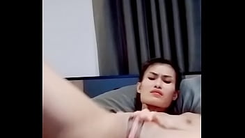 ThaiTwentyBabe: Asian babe fingers her big pussy lips and uses a dildo to orgasm